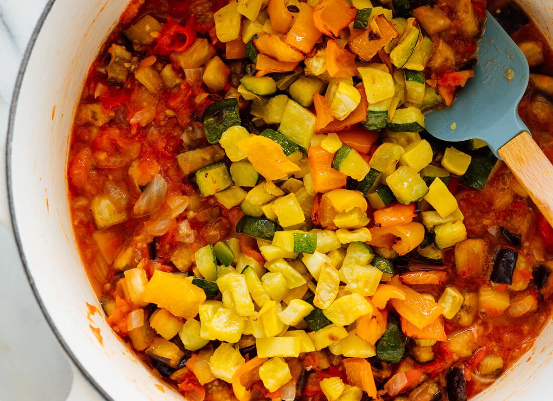 adding roasted squash to ratatouille