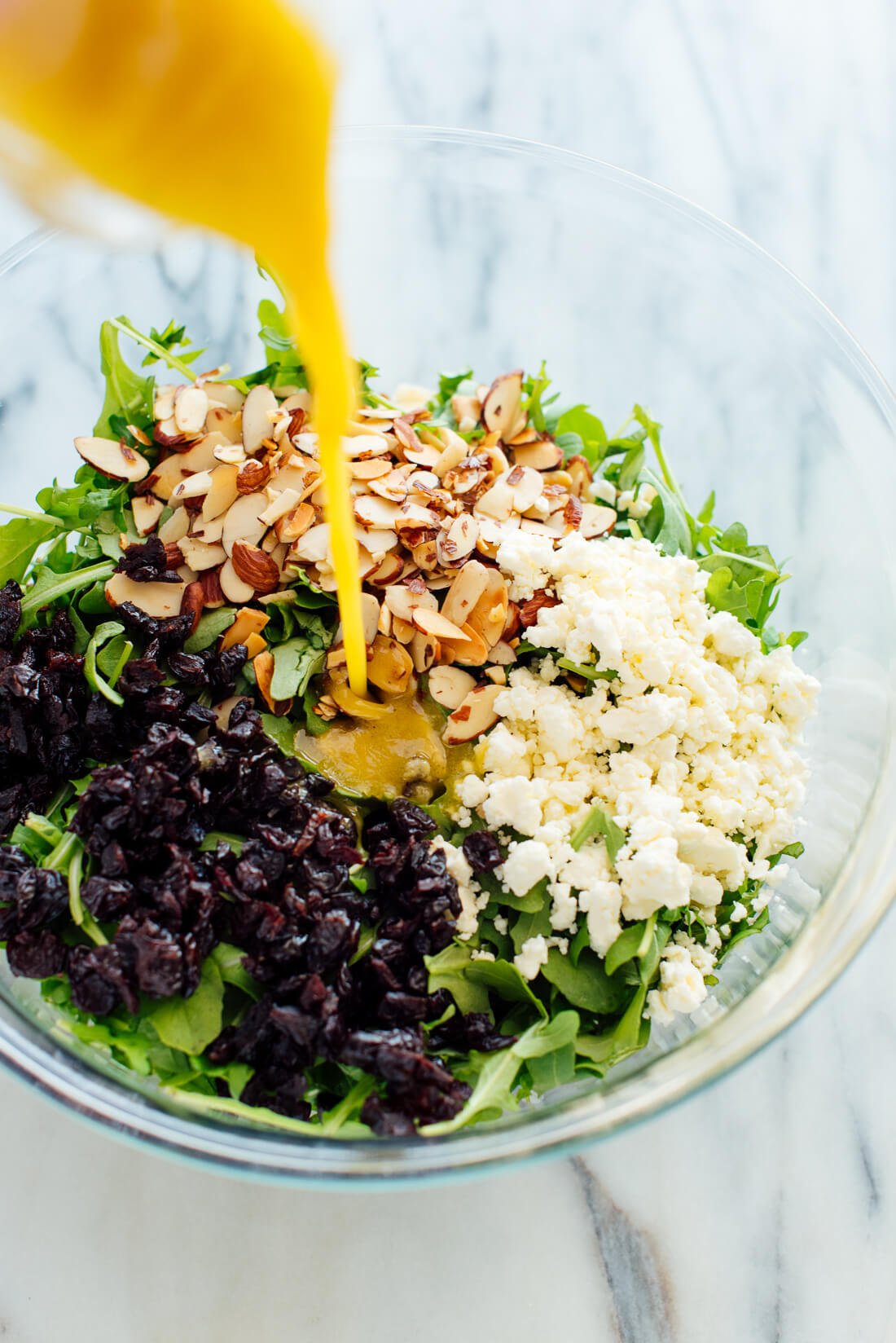 arugula wild rice salad recipe with feta almonds dried cherries lemon dressing