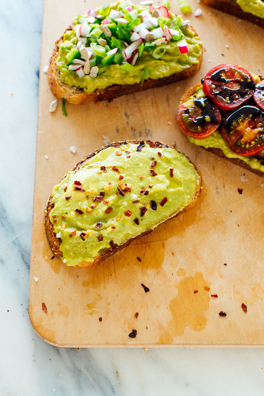 avocado toast with red pepper flakes, lemon juice and olive oil