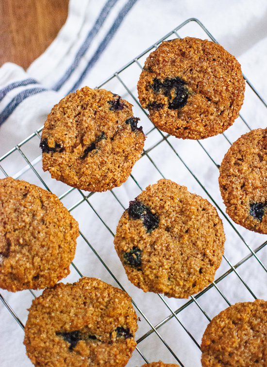 Honey sweetened, whole grain, blueberry bran muffins - cookieandkate.com