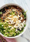 Shredded Brussels Sprouts & Arugula Salad with Sunshine Dressing