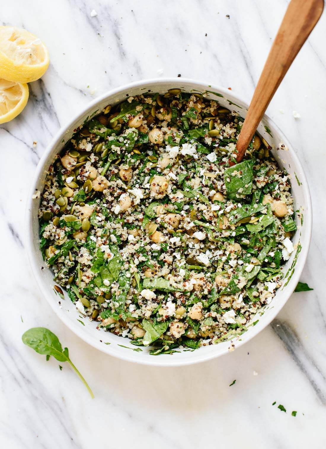 Healthy, hearty chickpea quinoa salad with lots of herbs and a delicious lemon-tahini dressing - cookieandkate.com