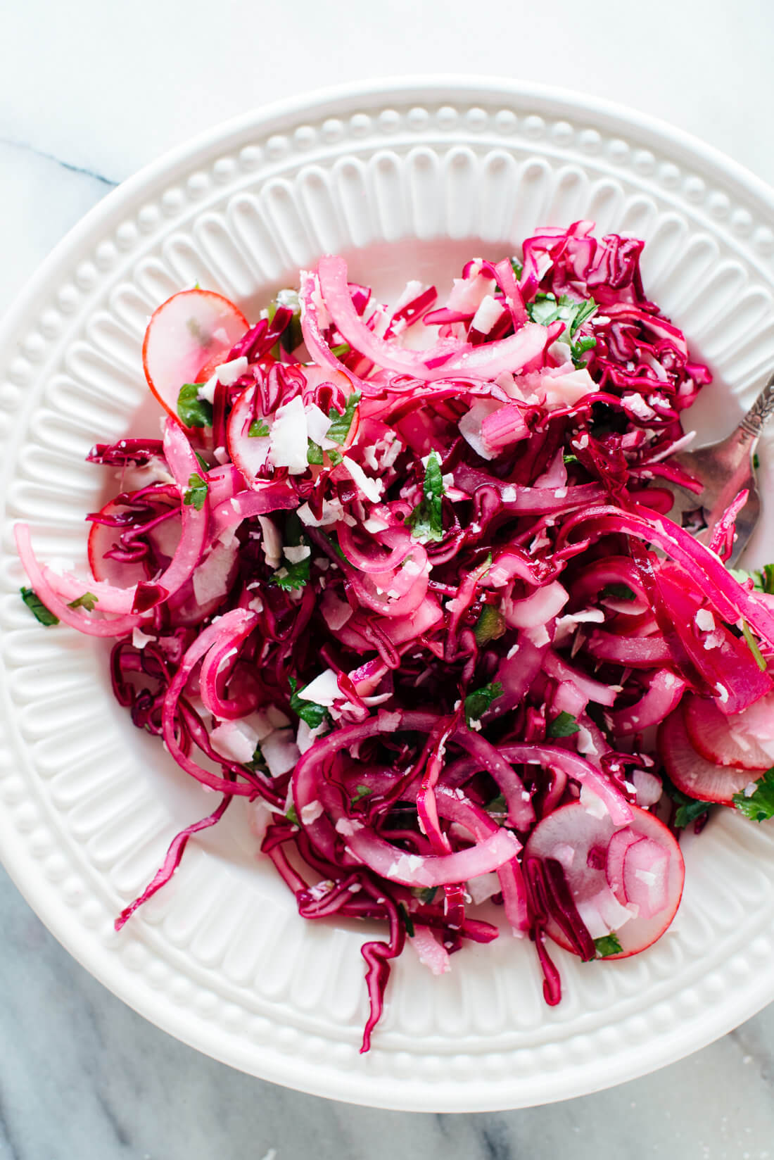 Coconut lovers, you're going to love this coconut cabbage slaw recipe! Get it at cookieandkate.com #vegan #glutenfree