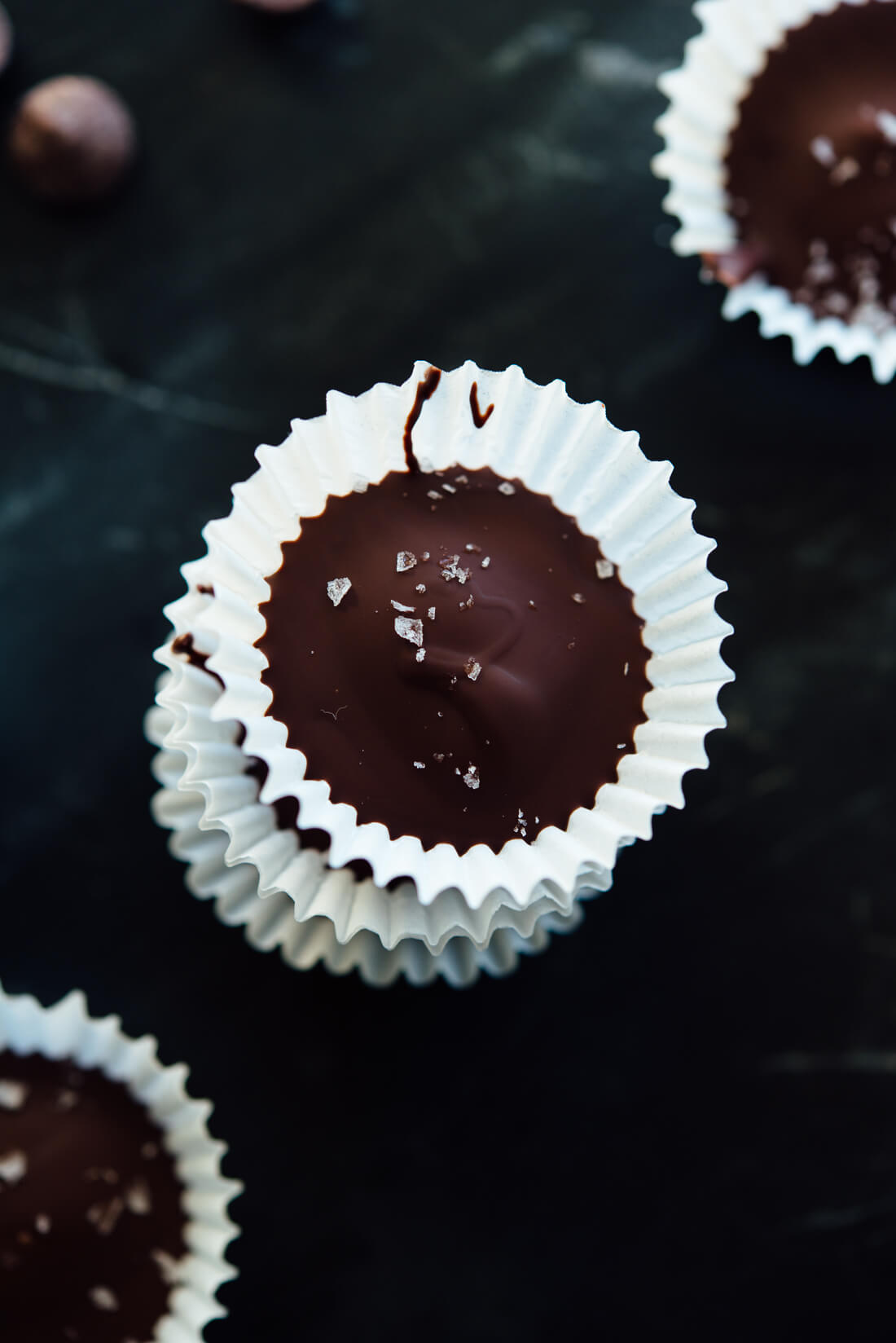 Easy homemade peanut butter cups recipe—the insides are naturally sweetened with maple syrup! You're going to love these.