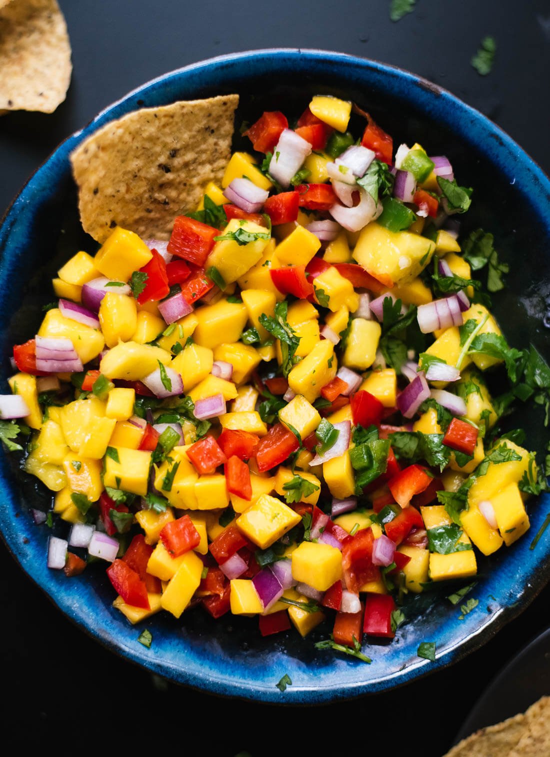 Fresh mango salsa recipe, perfect for tacos, potlucks and more! cookieandkate.com