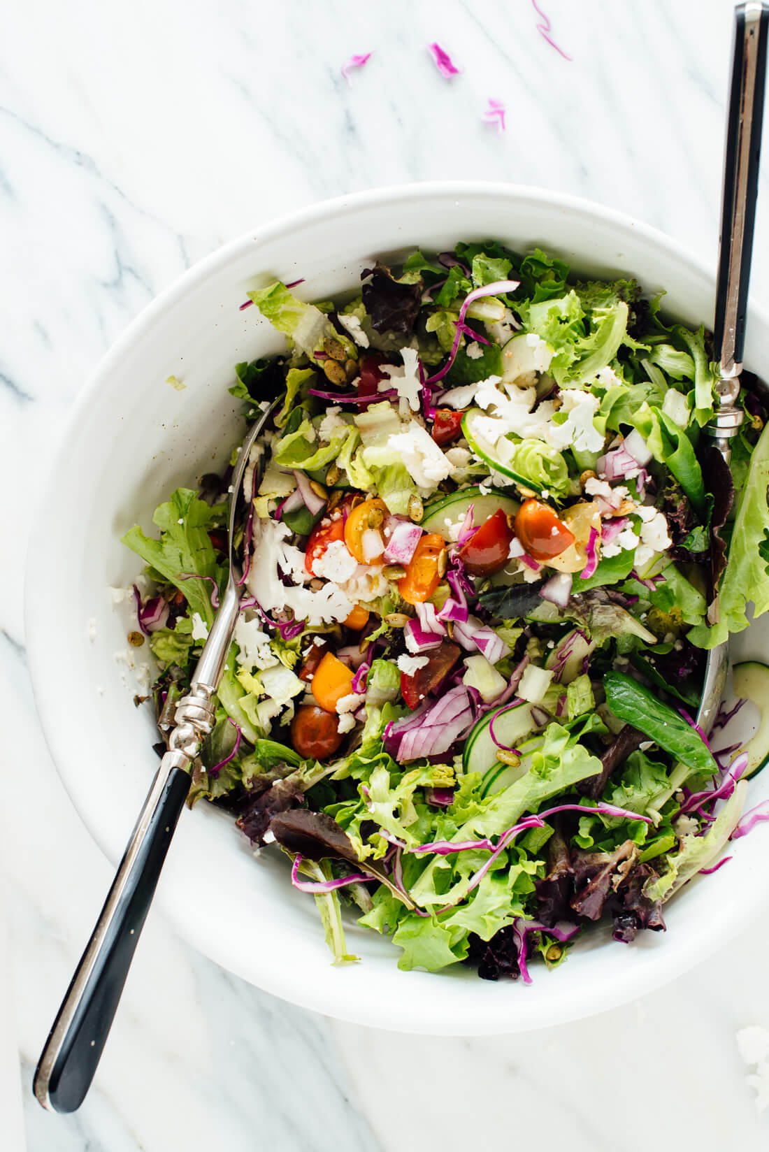 This healthy Mexican green salad recipe is the perfect fresh side for your favorite Mexican meals! It's also a delicious light meal on its own. cookieandkate.com