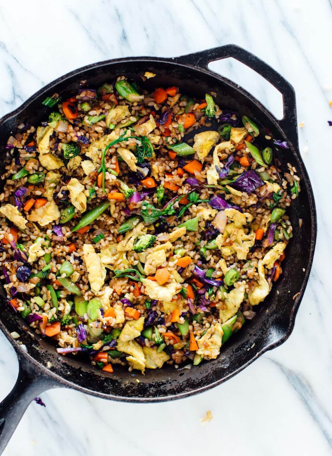 Learn how to make vegetable fried rice—it's a fun and satisfying dinner recipe! Vegetarian and gluten free. cookieandkate.com