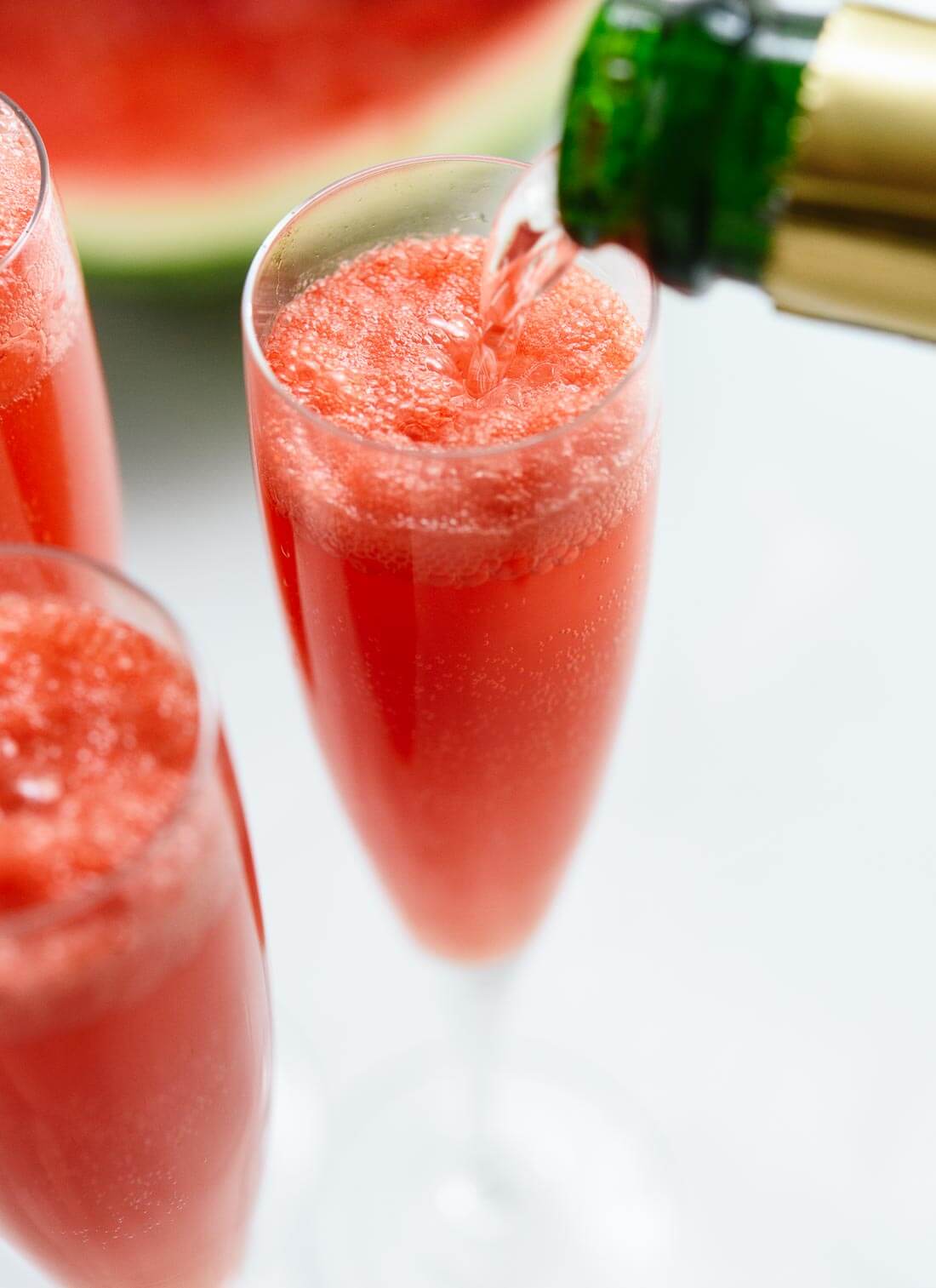 Learn how to make watermelon mimosas, so easy! cookieandkate.com