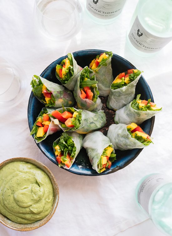 Fresh mango spring rolls with avocado cilantro sauce - cookieandkate.com