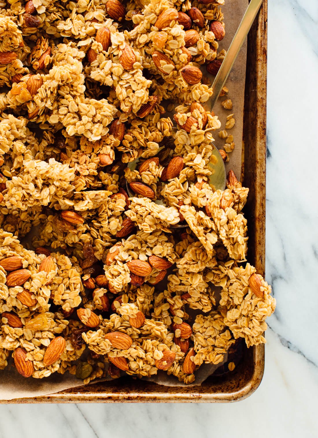 Clumps of orange almond granola