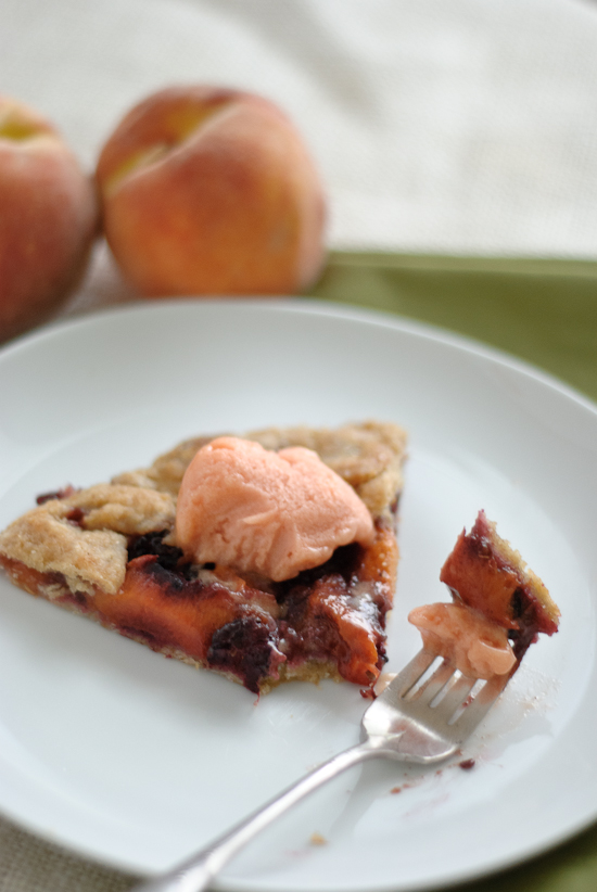 blackberry peach galette topped with peach sorbet