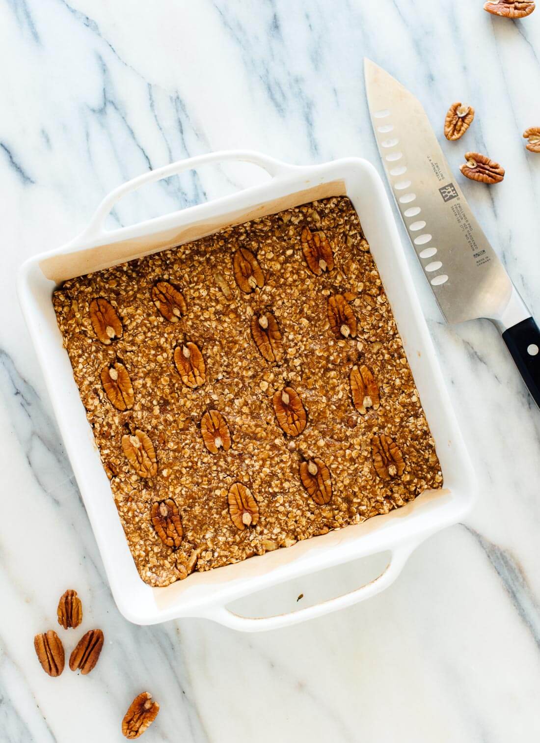 This pecan granola bars recipe is hearty and delicious! Enjoy these granola bars for breakfast or as a snack. Vegan and gluten free. cookieandkate.com