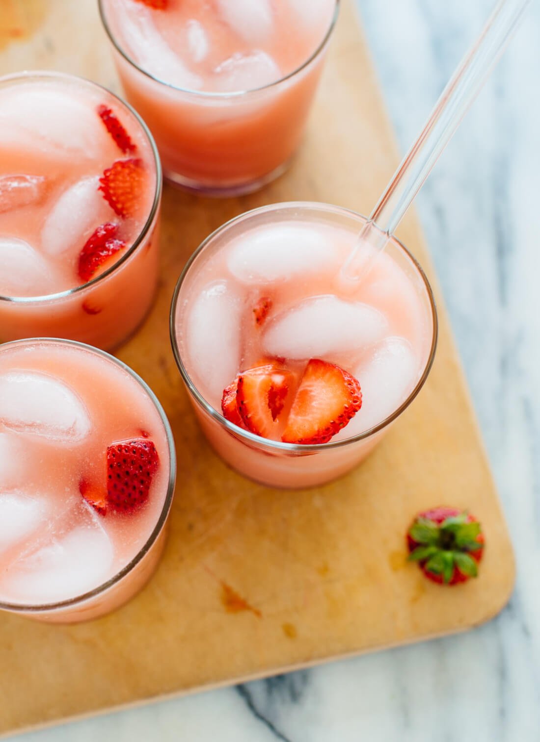 This "pink drink" recipe is inspired by the Starbucks drink. It's a light, refreshing and creamy drink to sip all summer long. cookieandkate.com