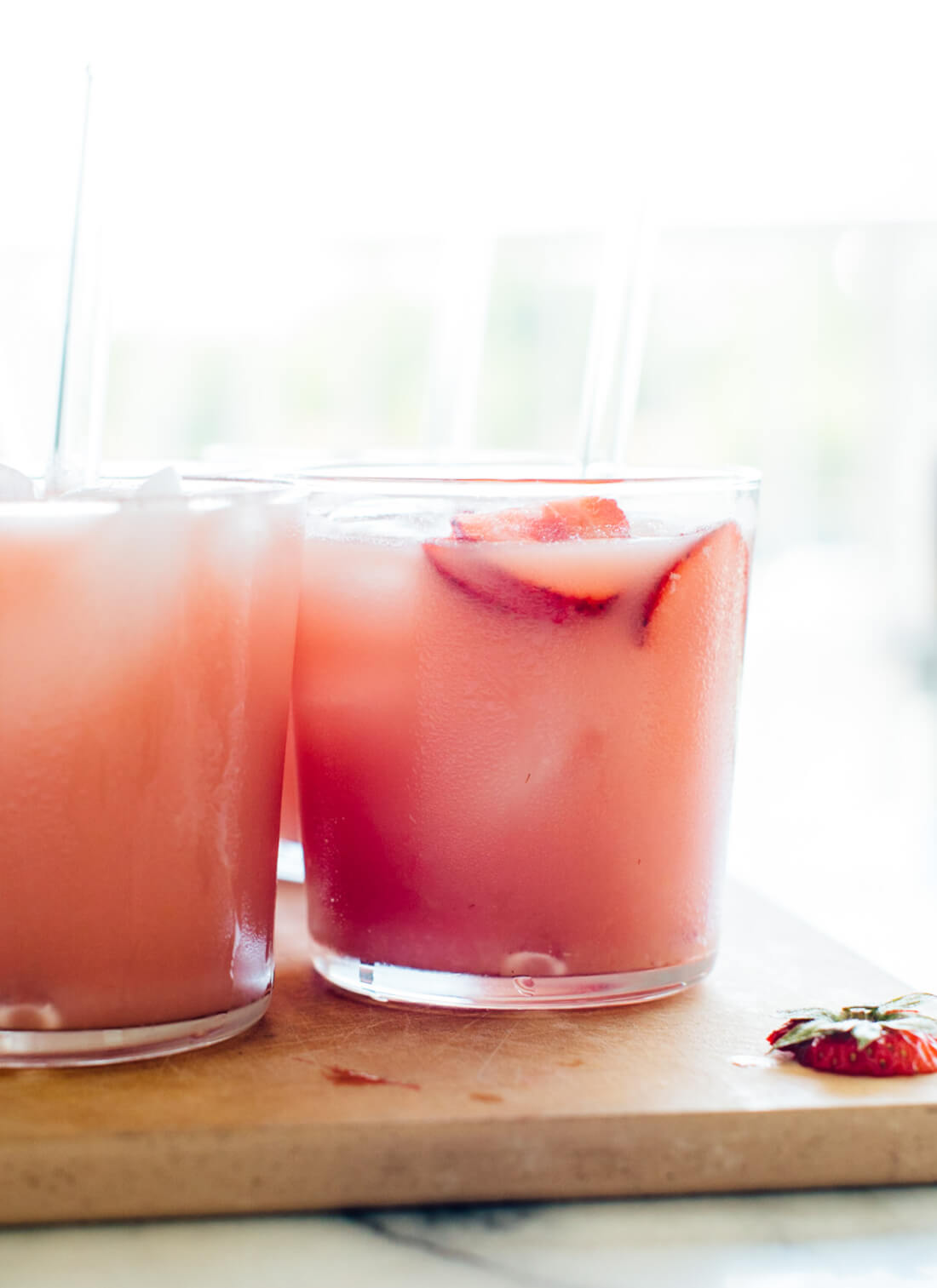 This pink drink is my interpretation of the Starbucks drink. Made with hibiscus tea, orange juice and coconut milk, this punch recipe is fresh, fruity and super refreshing. cookieandkate.com