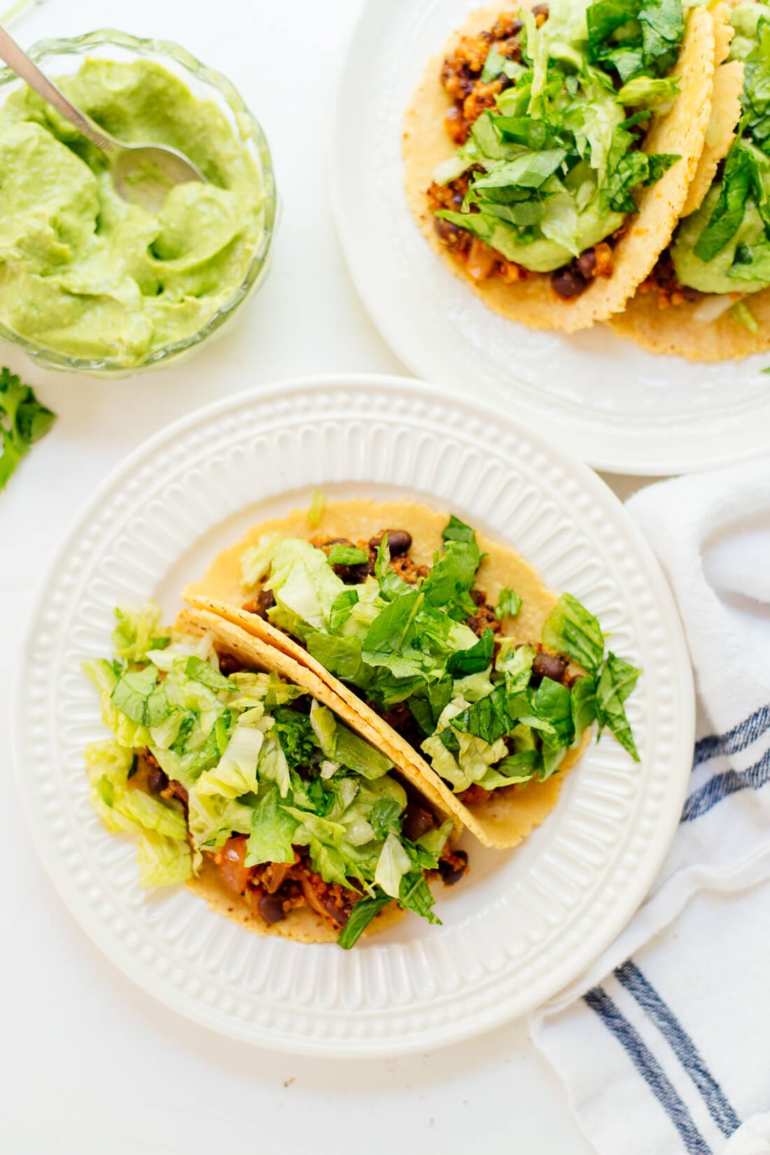 Quinoa black bean tacos with avocado crema