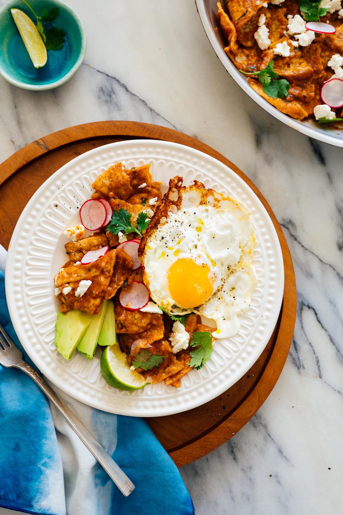 red chilaquiles recipe with fried egg and avocado