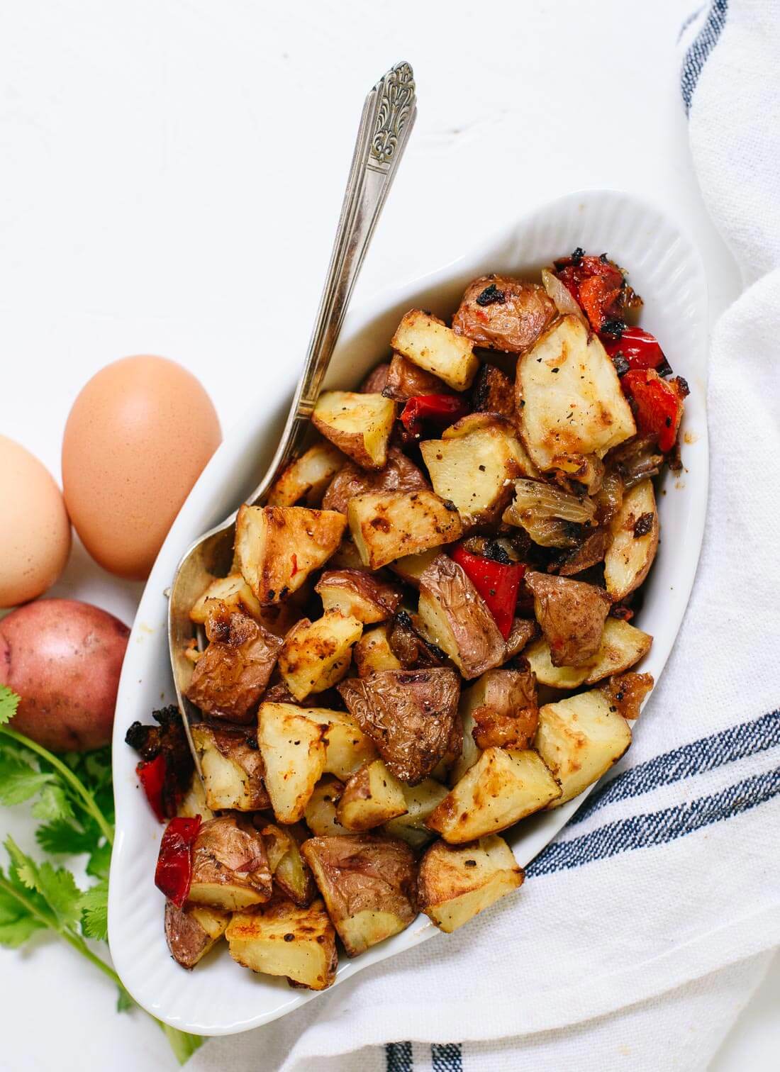 Amazing crispy roasted breakfast potatoes (also called home fries!). They are absolutely delicious, easy to make, and healthier than fried potatoes! #breakfast