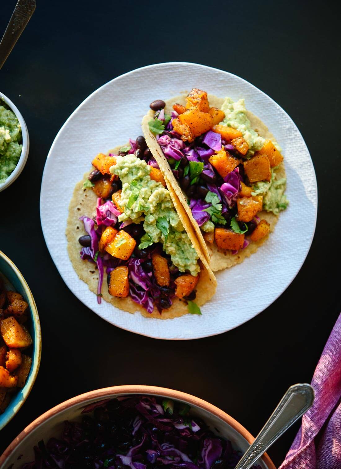 Roasted butternut squash tacos with guacamole! Vegan and gluten free. cookieandkate.com