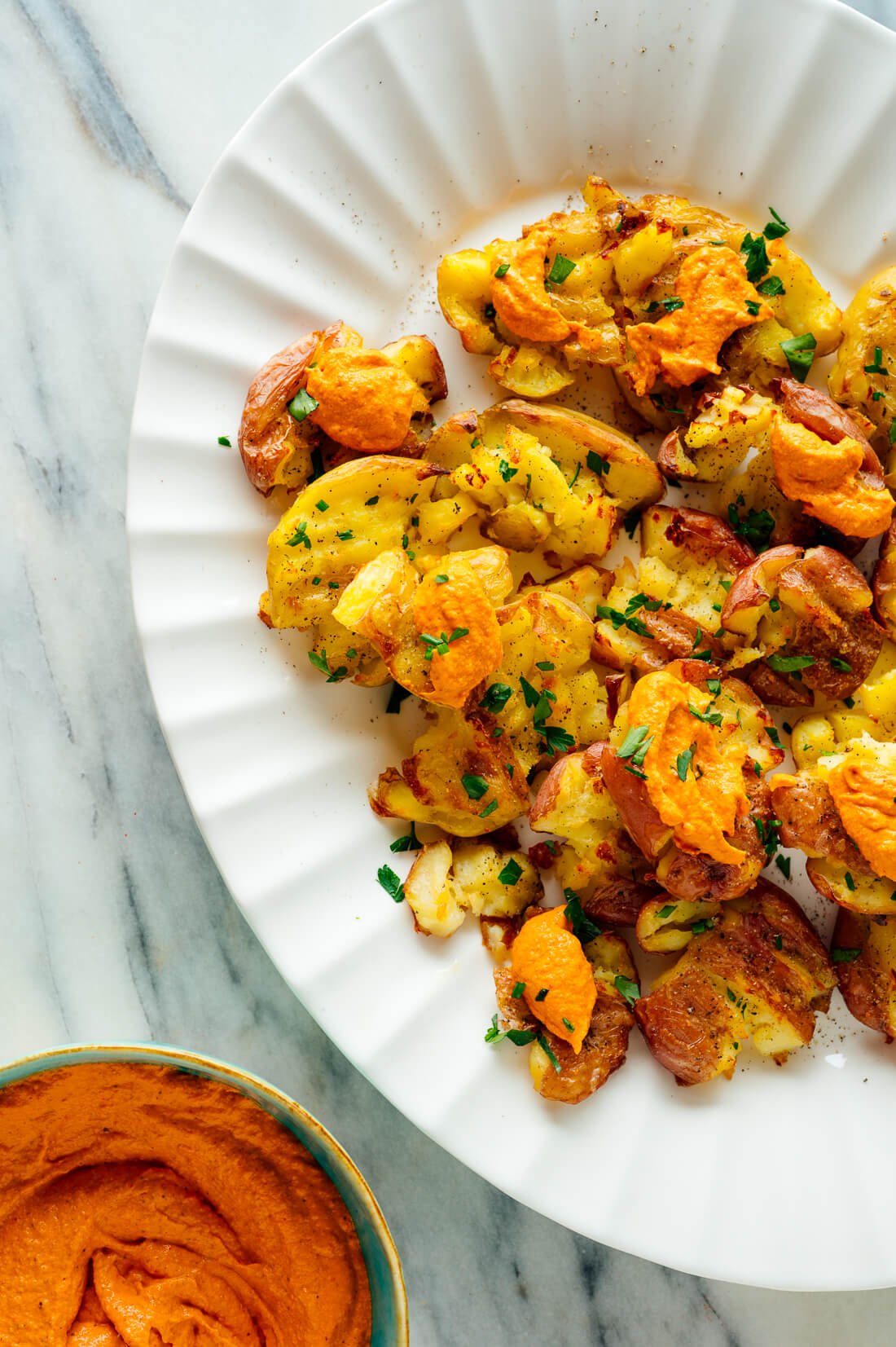 romesco sauce on smashed potatoes