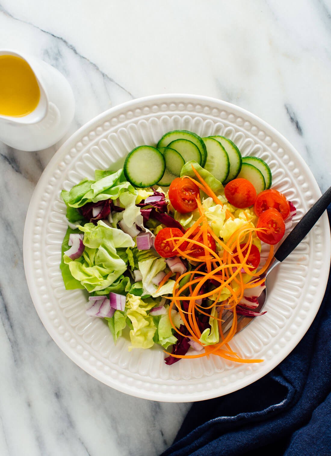 Fresh, simple side salad with homemade carrot-ginger dressing.