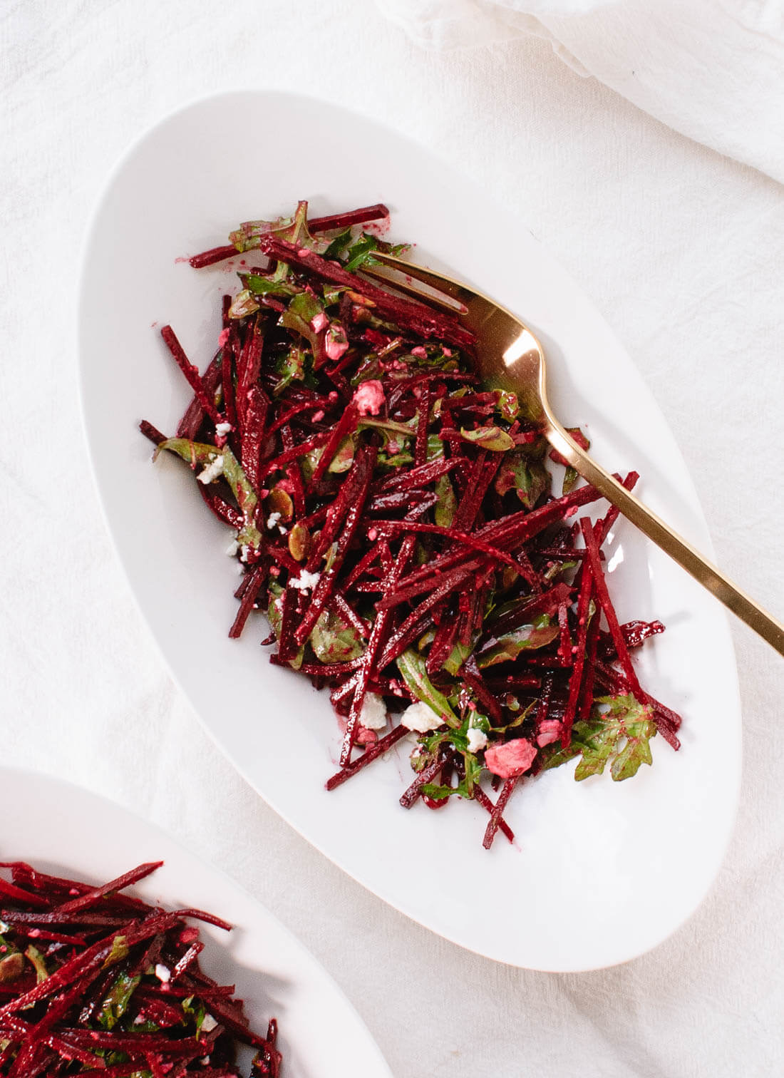 This healthy salad features a few marvelously complementary flavors: earthy beets, bitter arugula, salty feta, savory pepitas and tangy balsamic dressing. - cookieandkate.com