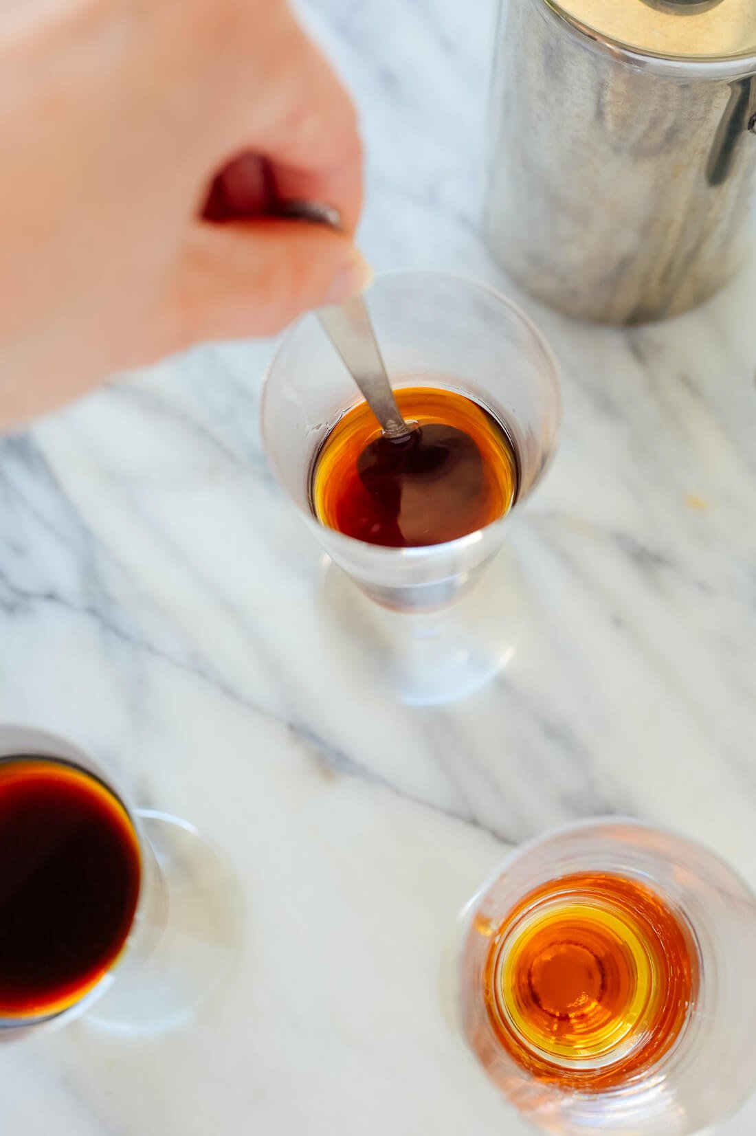 stirring sweetener into coffee