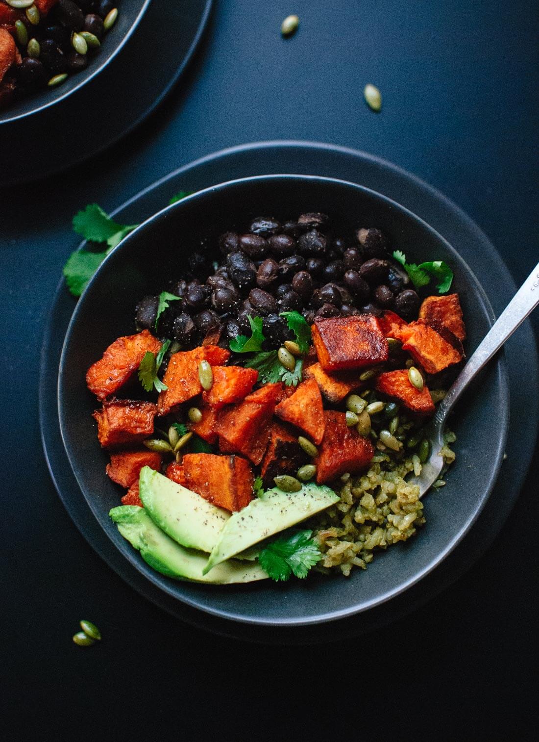 Roasted sweet potatoes with healthy green rice and black beans. Delicious!