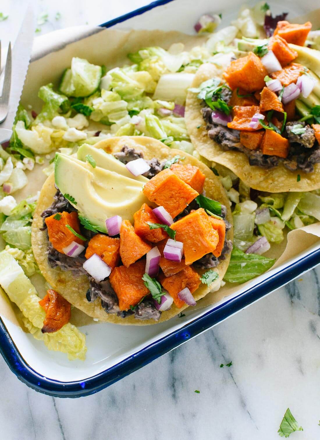 These delicious sweet potato tostadas make a great meatless dinner! Vegetarian, gluten free, and easily vegan. 