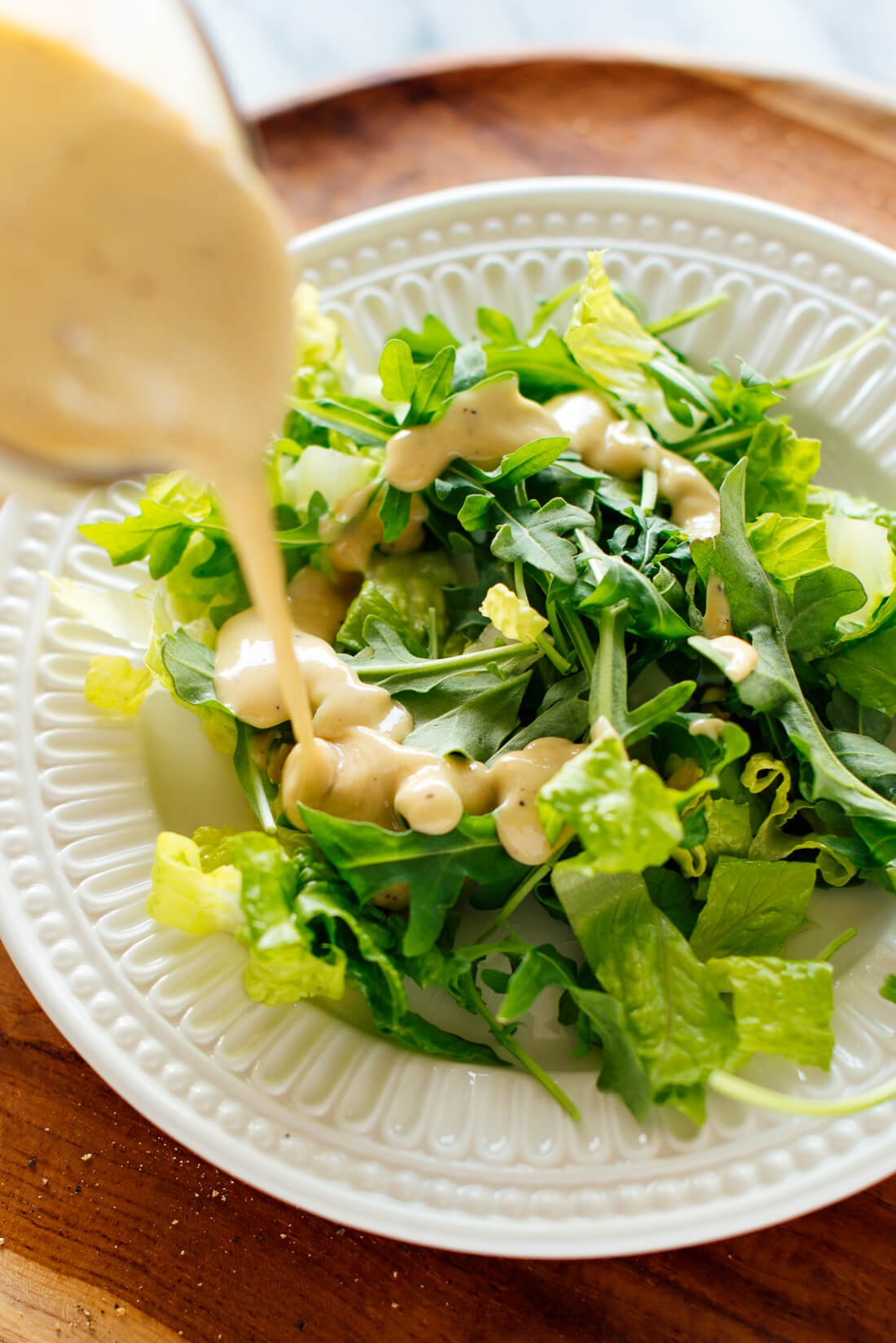 tahini dressing drizzled on salad