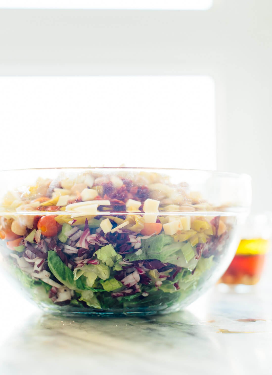 Vegetarian Italian chopped salad featuring chopped romaine, radicchio, cherry tomatoes, chickpeas and more!