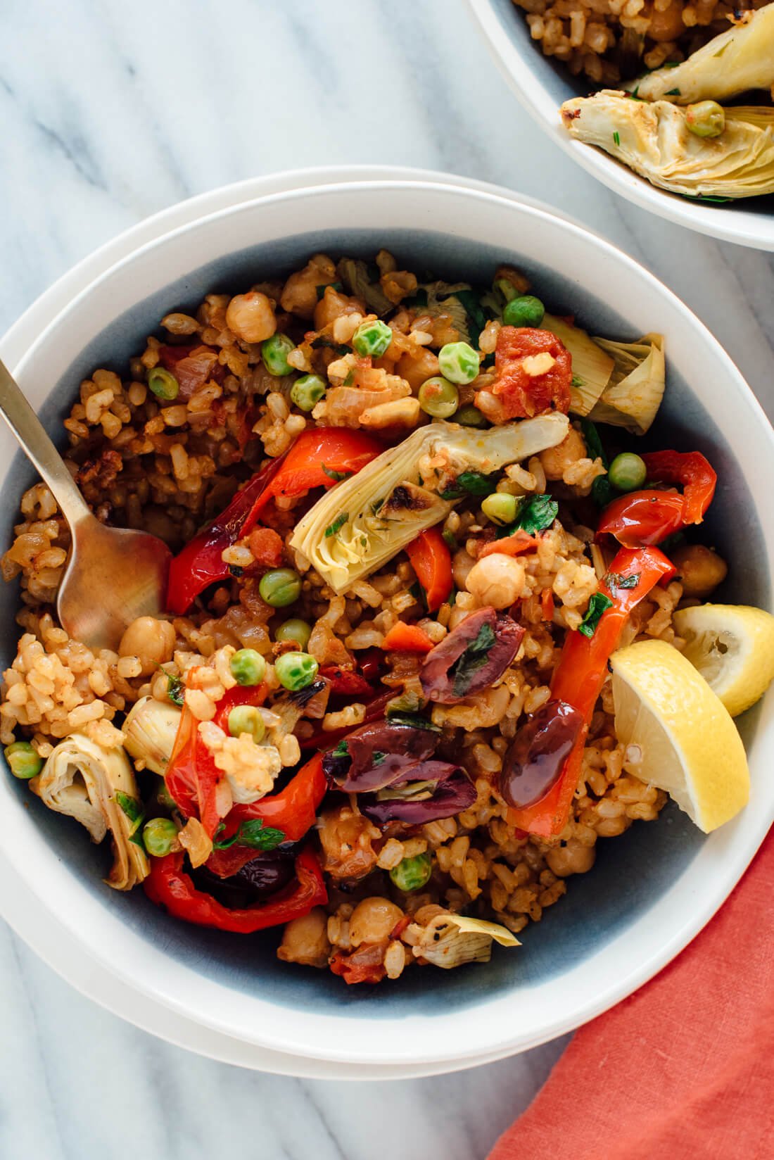 This vegetarian paella recipe is a veggie-packed twist on traditional Spanish paella! 