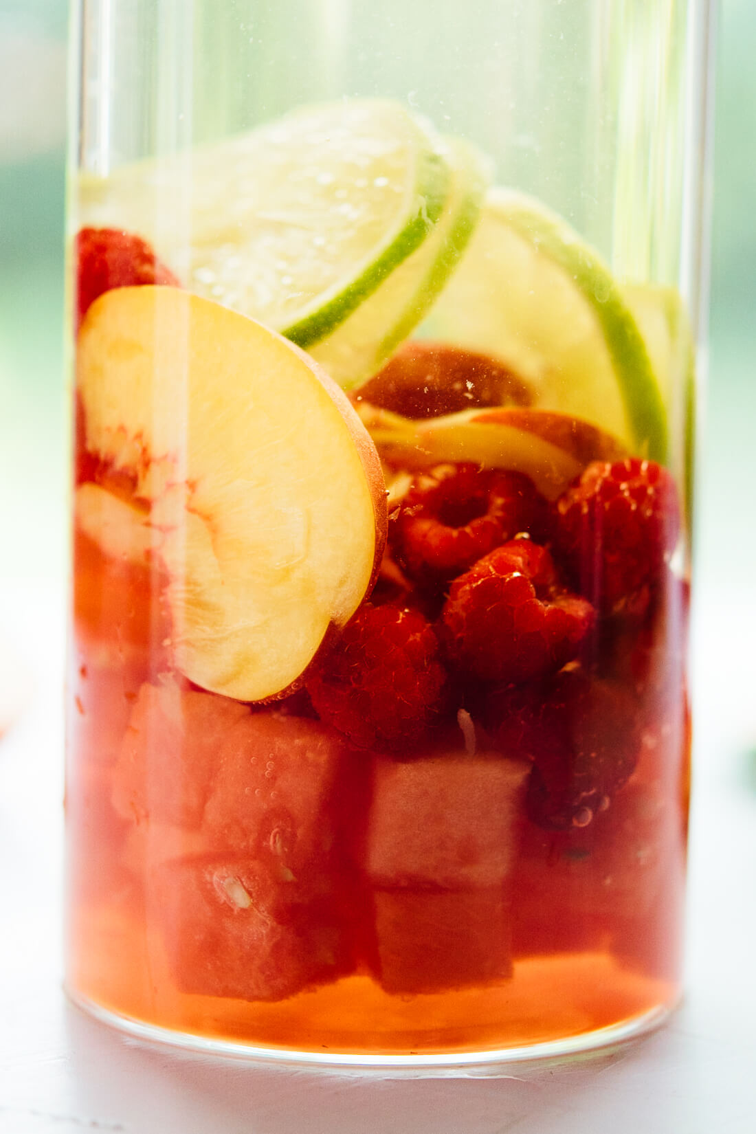 white sangria recipe with nectarine, lime, raspberry and watermelon