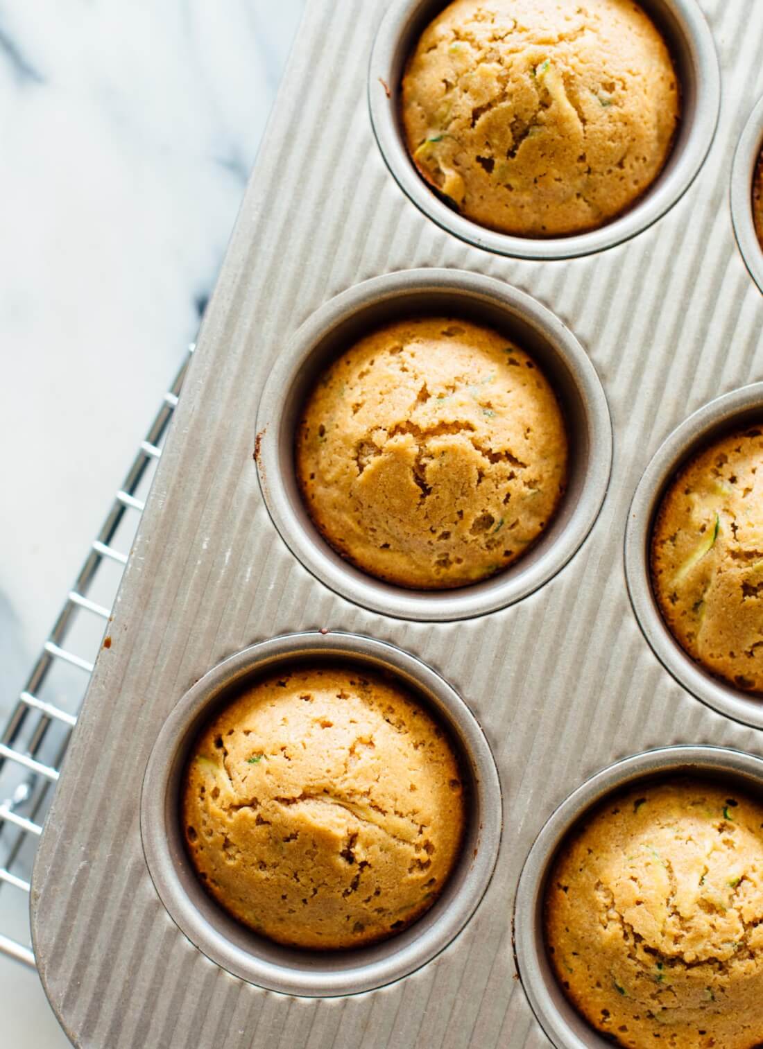 DELICIOUS whole-grain, naturally-sweetened zucchini muffins - cookieandkate.com