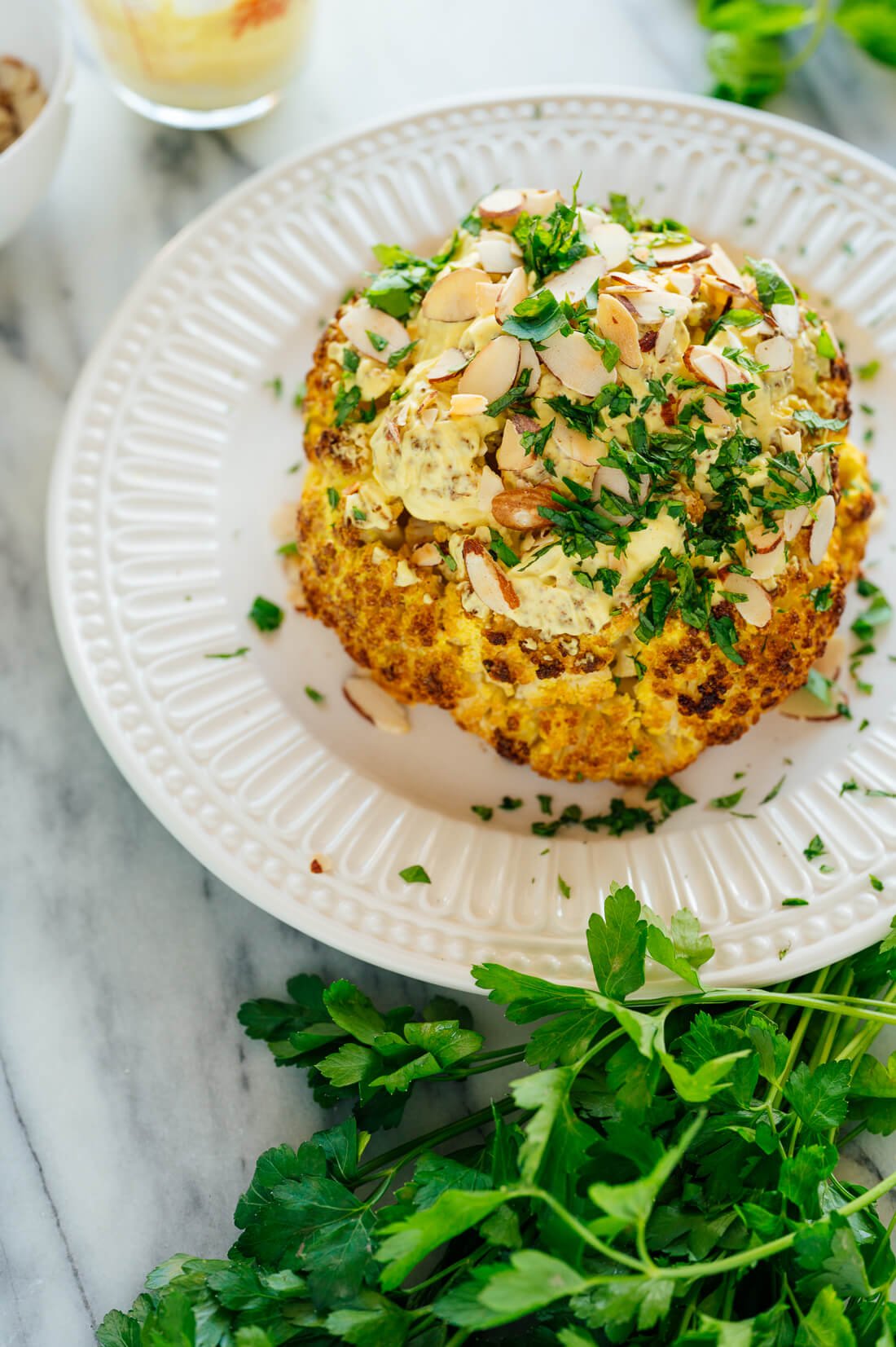 This whole roasted cauliflower recipe makes a statement! It comes from @loveandlemons new cookbook, Love and Lemons Everyday. #roastedcauliflower #cauliflowerrecipe #vegetarian #cookieandkate